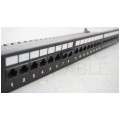 OUTLET Patch panel RACK 19" kat.5e 24p UTP z półką i pokrywą 1U czarny ZPAS